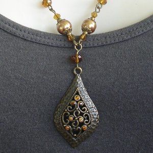 Bronze and amber colored beaded teardrop necklace with crystals